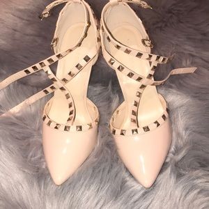 Pointy studded heels